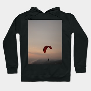 Paragliding in tandem over sea and beach at sunset Hoodie